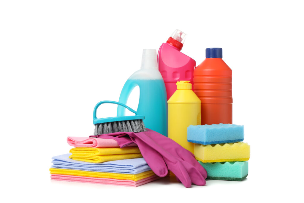 Bottles with detergent and cleaning supplies isolated on white background